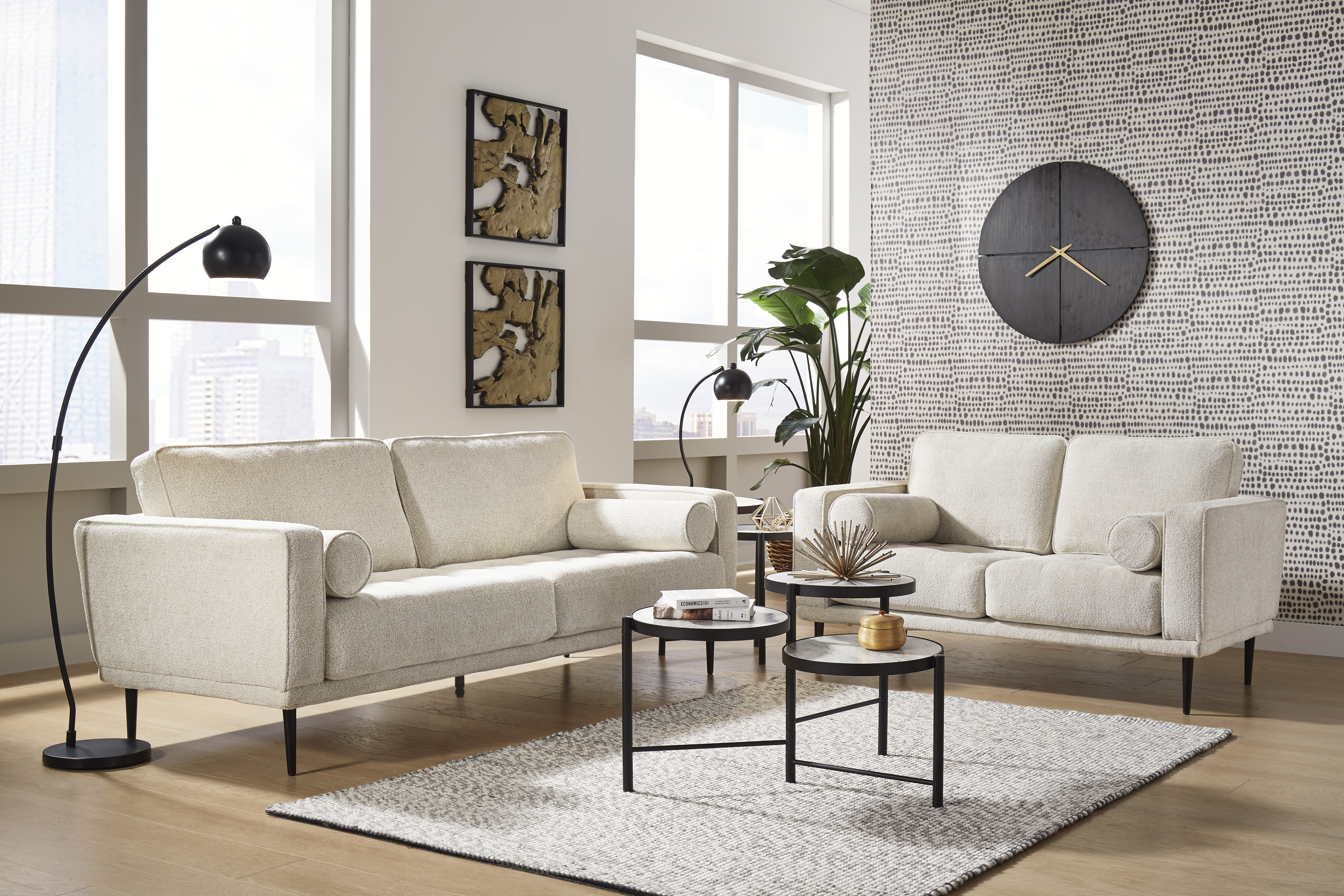HOW SHOULD ONE POSITION A SOFA IN A SMALL ROOM TO MAXIMIZE AESTHETIC APPEAL