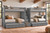 Dillon quadruple Twin XL bunk bed in gray with center storage stairs and four sleeping spaces