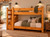 Lodge Barnwood Twin XL over Twin XL bunk bed with four-step solid wood staircase in Honey Pine finish