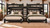 Lodge Barnwood side-by-side Full loft beds in Weathered Black with two optional lower beds and shared slanted center access ladder.