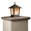 A classic, traditional sloped-roof column mounted pier light fixture with crown molding accent, a bronze finish and warm white glass. 