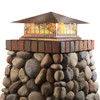 A classic, traditional sloped-roof column mounted pier light fixture with crown molding accent, a raw copper finish, floral artwork and golden glass. 