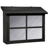 A large brass mailbox with a black finish, white glass and a cross design on the front panel. 