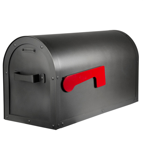 A solid brass, post mounted mailbox with a curved roof, satiny black finish and bright red metal flag.