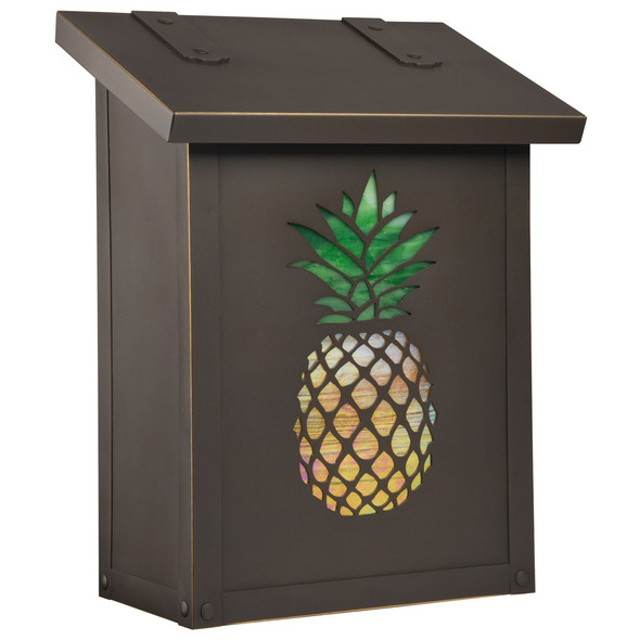 A solid brass, vertical  mailbox with an oil rubbed bronze finish and a glass-backed pineapple silhouette. 