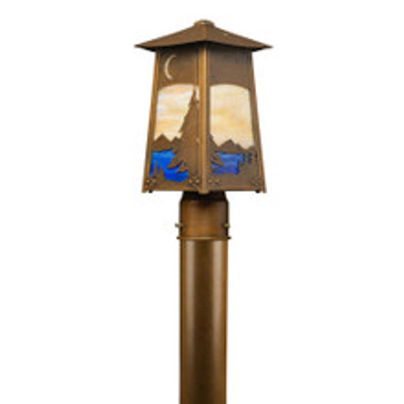 A post mounted, art nouveau landscape light with a warm, aged finish, creamy glass and lake landscape filigree with a spruce tree and a night sky.