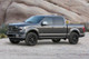Fabtech 15-18 Ford F150 4WD 2in Uniball UCA System w/DL 2.5 Resi Coilovers & Rear DL 2.25 Shocks