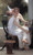 Fine Art Prints Woman in white dress sitting with cherub, William-Adolphe Bouguereau's "Work Interrupted" in 16x27 size, depicting serene classical scene with basket.