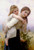 Fine Art Prints Not to Much to Carry, Bouguereau, a large 17.5x26 art piece depicting a woman carrying a child in a field, showcasing a tender moment.