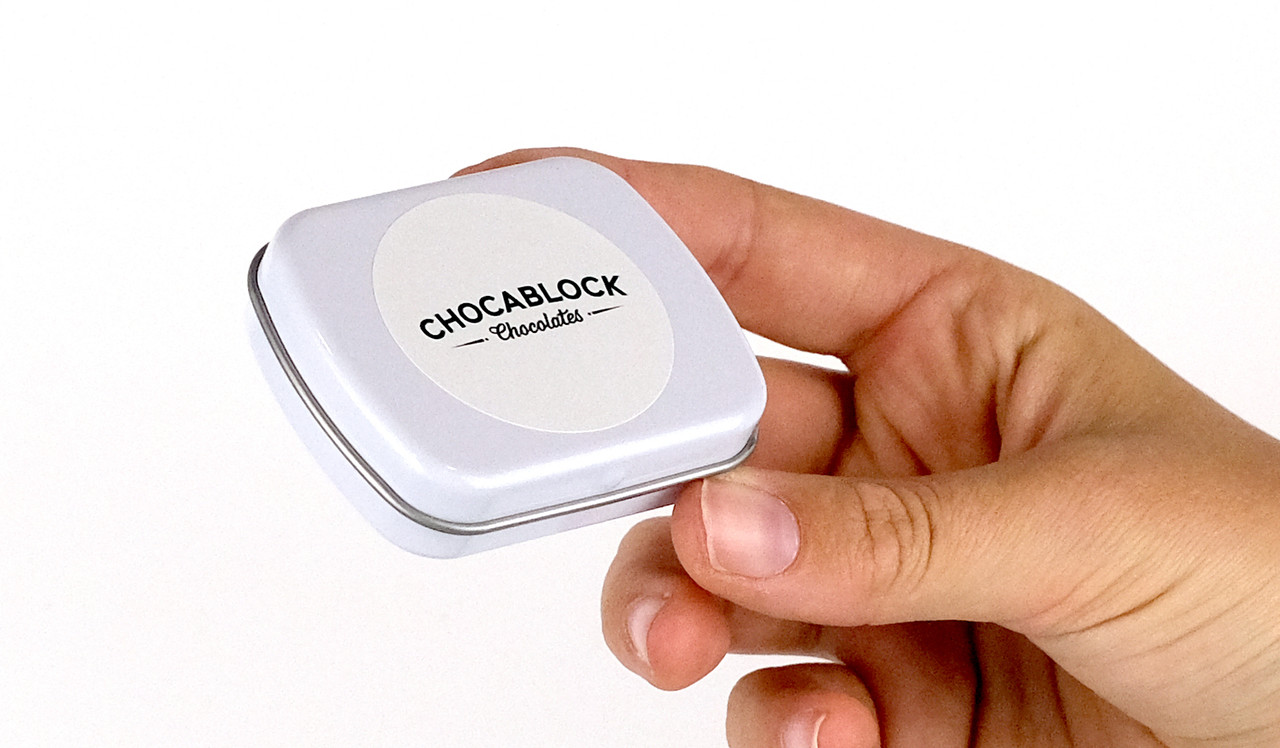 Model holding mint tin