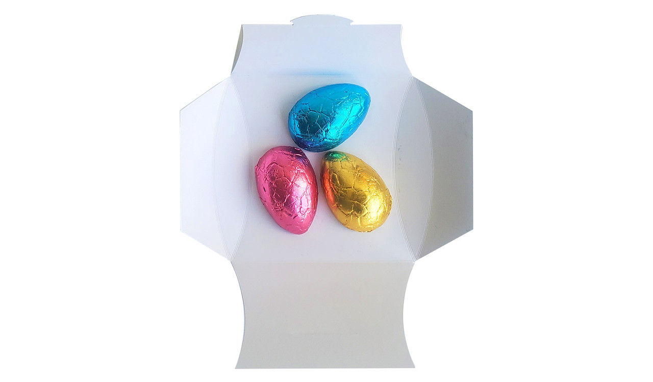 Pillow box once opened with half eggs inside