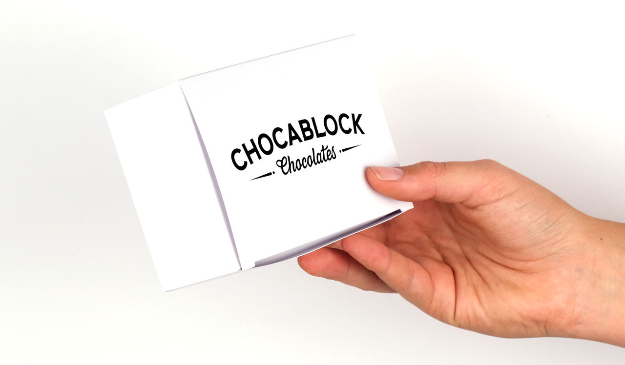 Model holding tuck box for sizing reference