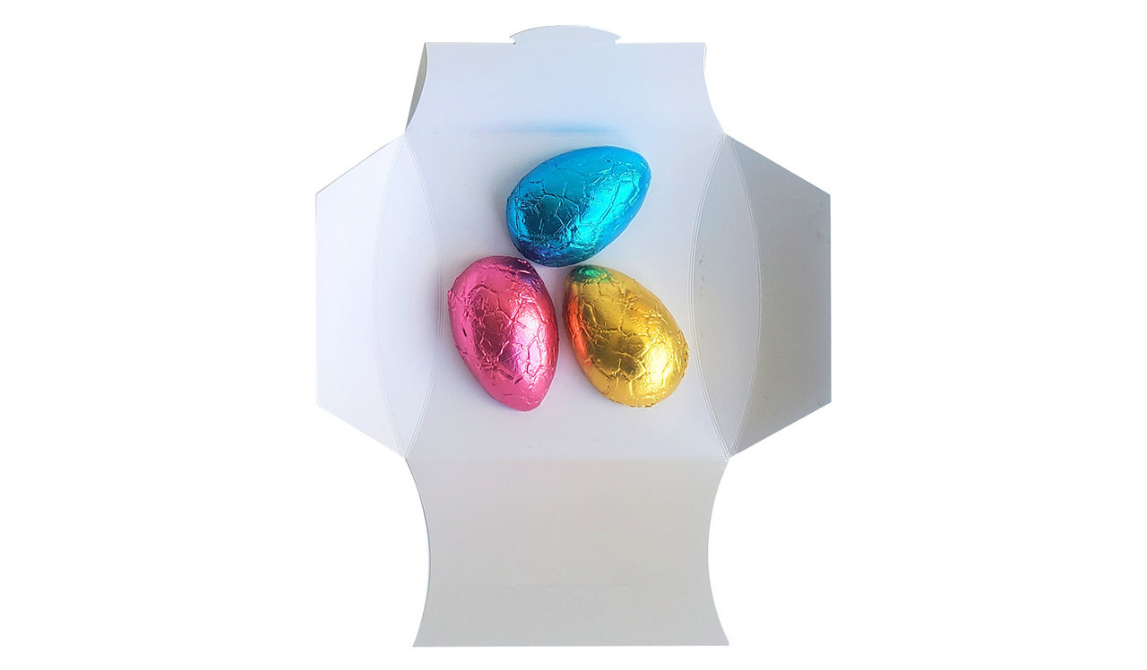 Pillow box once opened with half eggs inside