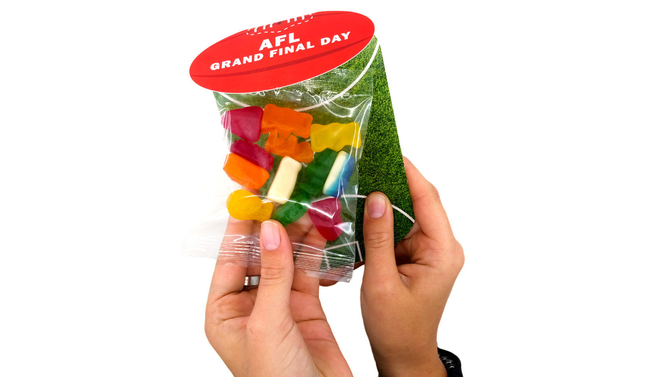 Football shape and backing card is one connected shape.
