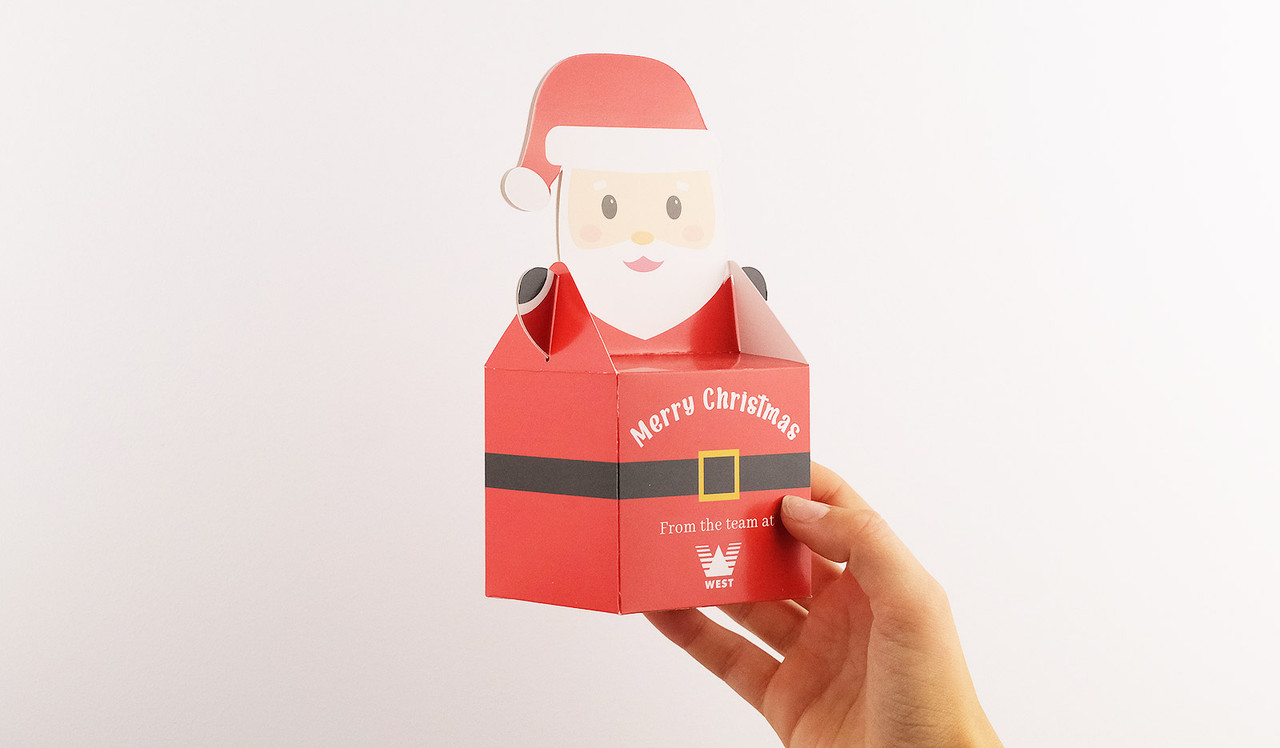 Model holding Personalised Santa Box 18cm