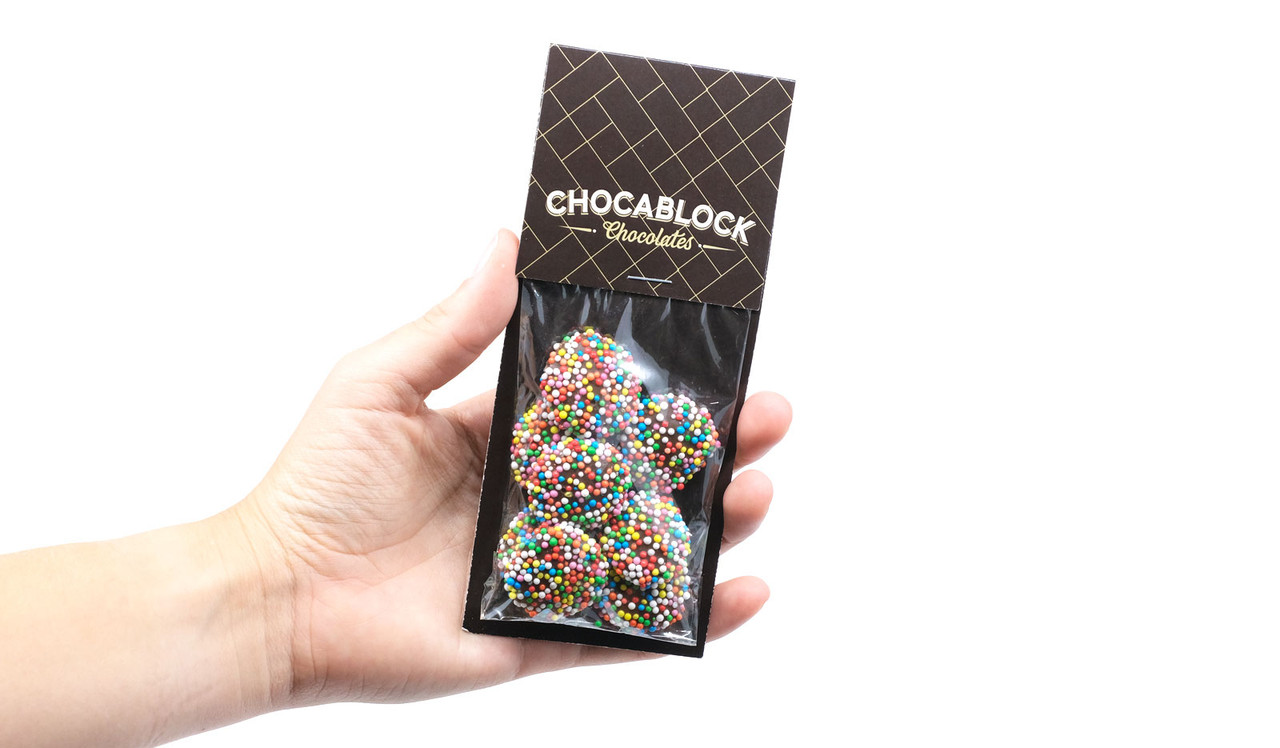 Model holding Milk Chocolate Mini Speckle Card