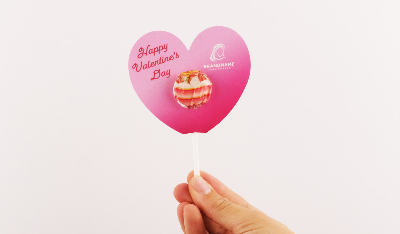 Model holding Custom Heart-Shaped Pop Holder With Chupa Chup