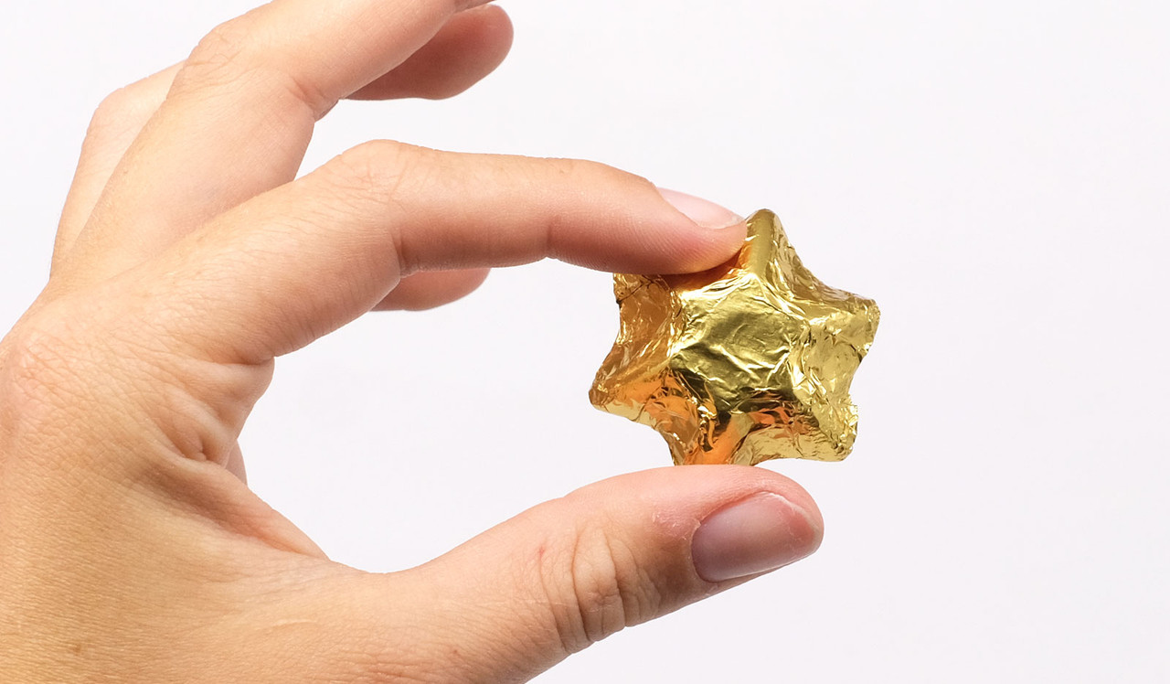 Model holding Chocolate Star for display purposes