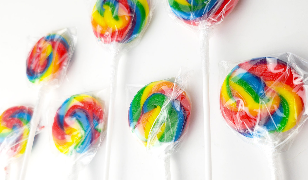 Flat lay of rainbow lollipops