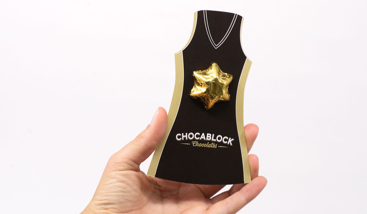 Model holding Netball Card for display purposes