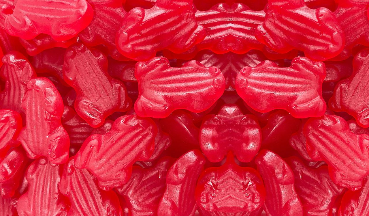 Close up of red frog lollies and confectionery