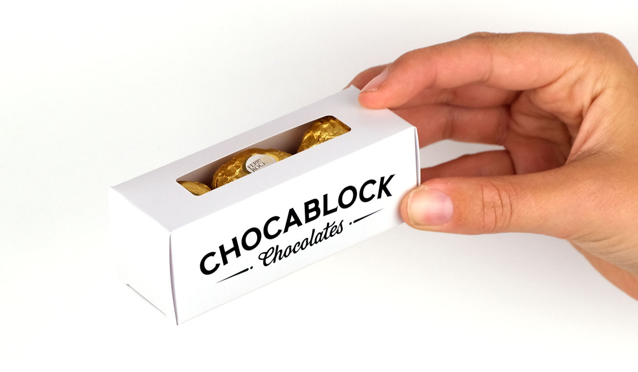 Model holding Ferrero Rocher 3-pack gift box