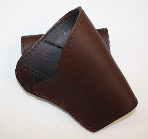 Blackpowder pistol holster made from sturdy oak-tanned leather, cross draw style, fits left or right hand carry, designed for 2.5-inch belts.