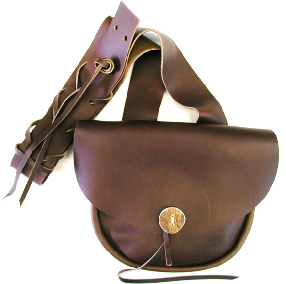 Shooter Possible Bag with raw-edge leather front pocket, moose antler button closure, adjustable lace strap, in dark brown leather by October Country