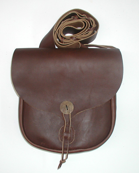 Seneca Possible Bag with belt loop, bone button closure, raw-edge front pocket, and adjustable lace in dark brown leather by October Country Seneca Possible Bag with belt loop, bone button closure, raw-edge front pocket, and adjustable lace in dark brown leather by October Country