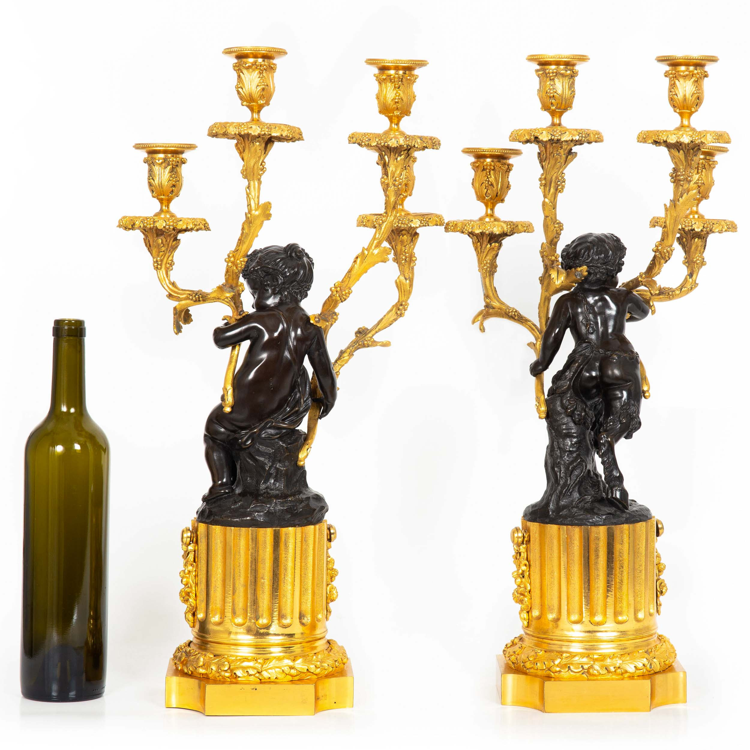 Pair of Louis XVI Style Four-Light Candelabra after Clodion