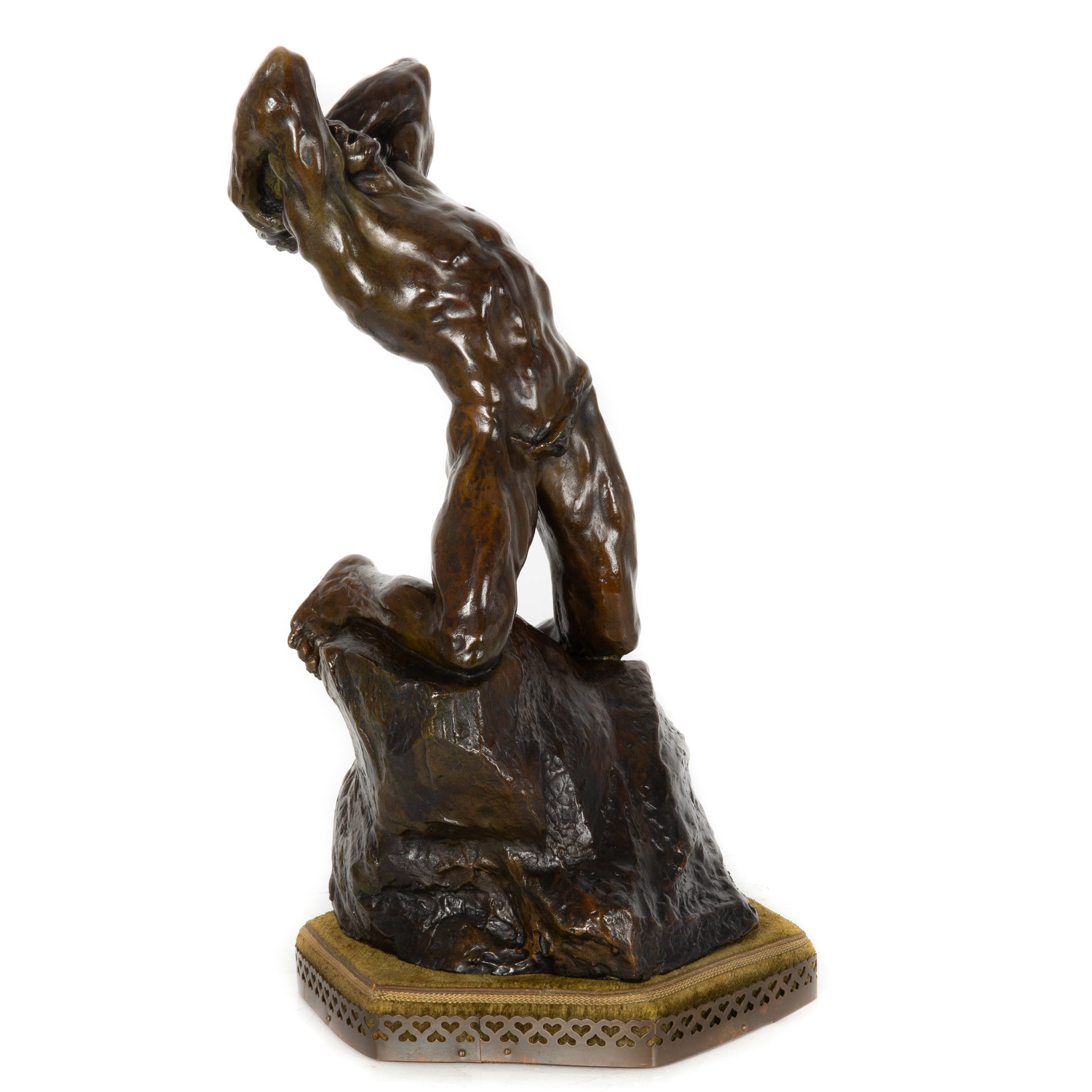 Homme à Genoux sur un Rocher