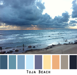 Tuja Beach - blue teal sky indigo gold peach tan black sunset glow  Baltic sea, sand and dark blue storm clouds, colors for blue green brown eyes, blonde hair, brunette, redhead, black hair - photo by Inese Iris Liepina, Wrapture by Inese