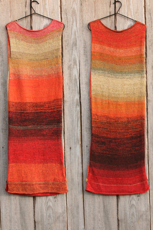 both sides shown in double photograph of size S Sumac in autumn inspired random ombre stripe calf length tank dress on hanger with woodshed background