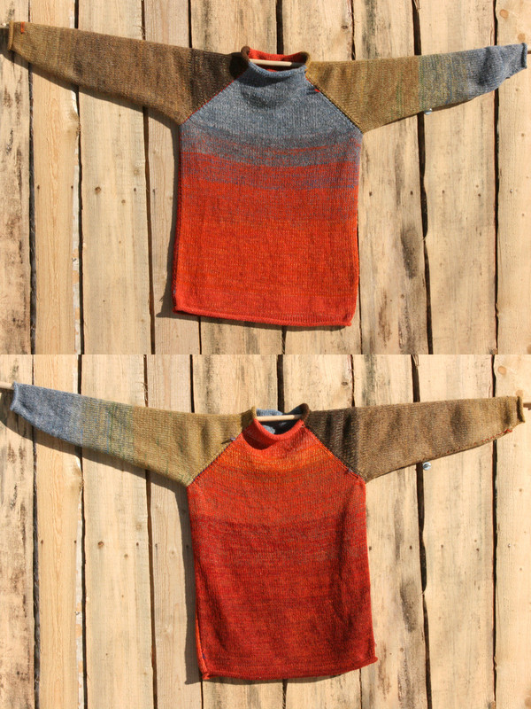 Fall Sky orange rust blue grey taupe reversible unisex raglan pullover showing both sides in a double photograph where the sweater is hung on a wood shed, designed and knit by Wrapture by Inese