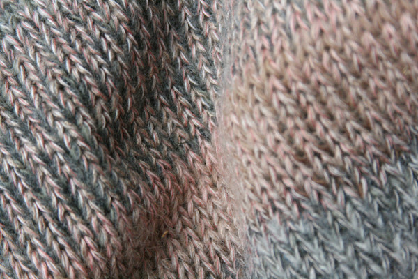 Catalonia Road tan ivory heather grey taupe closeup of knitting detail showing how Inese does her unique color blends