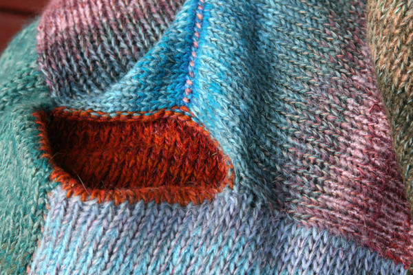 closeup of pocket detail of sweater dress. Wrapture by Inese
