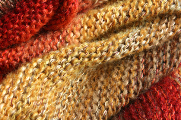 detail of knitting Maple Leaves inspired shawl wrap knit by Inese for Wrapture by Inese in red, gold, taupe ombre knit