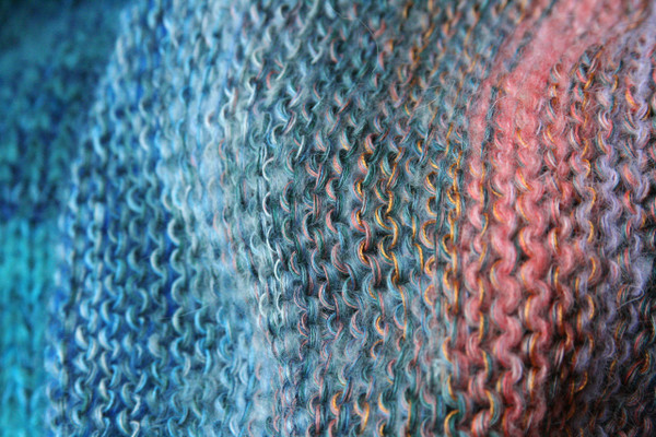 Catalonian Sea detail of knitting in blue teal pink