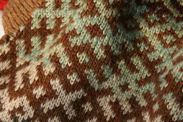 chocolate Latvian symbols sweater detail of pattern knitting 