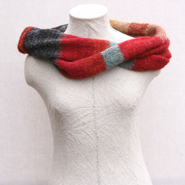 Rakvag color card inspired loop scarf knit by Inese for Wrapture by Inese on dress form with white background