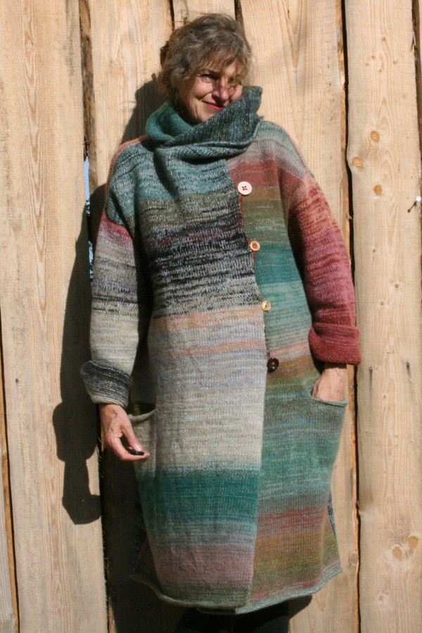 Inspired by the colors of Birch in an XL felted wool coat with a shawl collar that can be worn in multiple ways. Knit with local Baltic raised wool, cotton, silk. Machine washed and felted. 
Wrapture by Inese