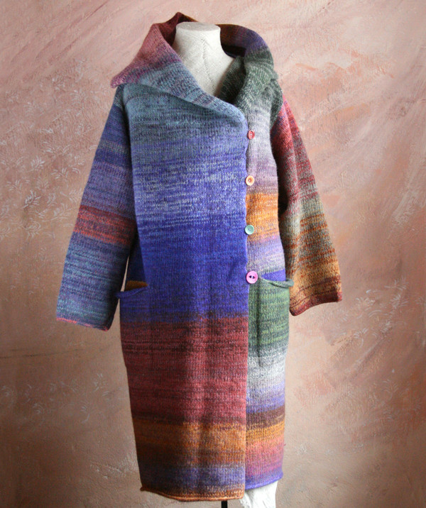 One of a kind felted wool coat knit by Inese with colors inspired by my Plum tree. Size S , shown on dress form with shawl collar buttoned into a snug collar cowl.