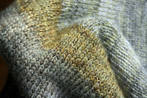 detail of ombre color change of knit Grey Leaves dress, knit by Inese Iris Liepina of Wrapture by Inese