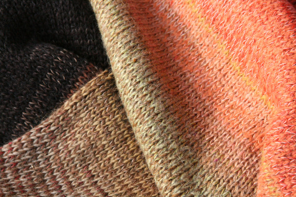 closeup of knitting detail in yellow rose hips calf length tank dress knit by Inese Iris Liepina