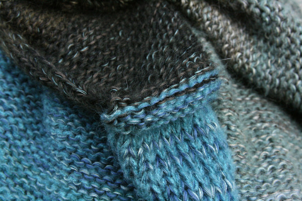 Fjord Edge shawl wrap closeup of knitting detail with ombre color changes knit by Wrapture by Inese