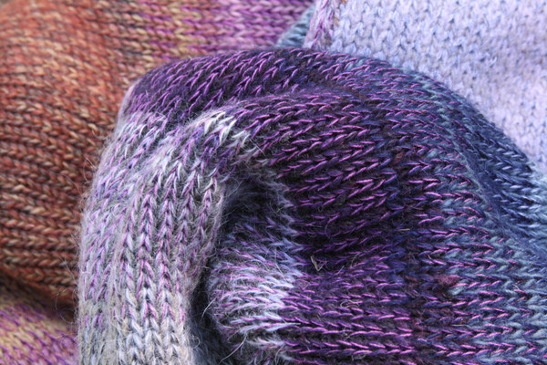 closeup of knitting detail in Plum calf length tank dress knit by Inese Iris Liepina