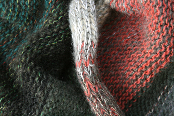 Winter Apples color way closeup of knitting detail of snood cowl knit by Wrapture by Inese