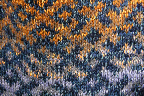knitting fair isle Latvian symbols pattern closeup in Denim Sunset XL reversible sweater