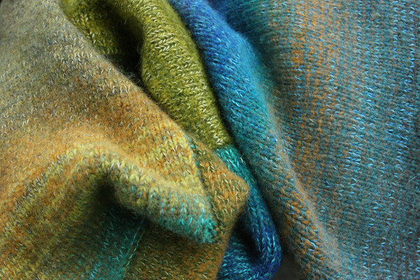 detail of Mongolian Trek colors inspired boiled wool hoodie jacket by Wrapture by Inese