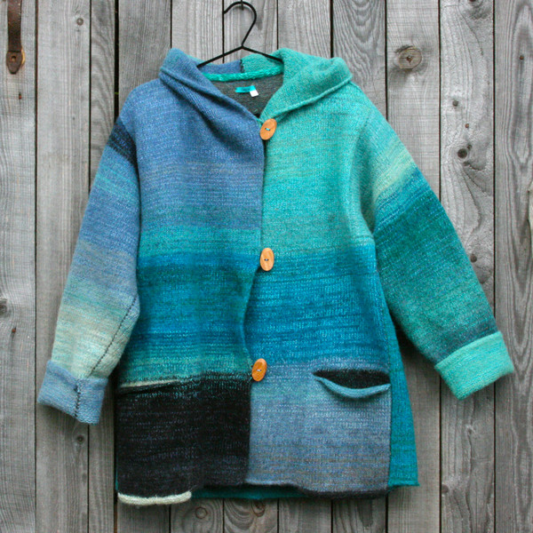 Hoodie inspired by a New Zealand lake, knit by Wrapture by Inese